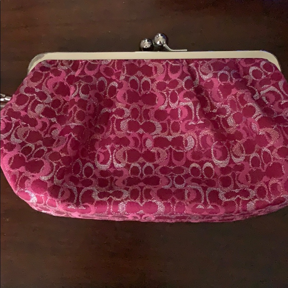 Beautiful pink and silver coach wristlet/purse